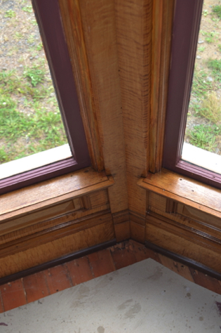 Front parlor window trim: cedar exposed by wall reconstruction colored. Front parlor window trim: cedar exposed by wall reconstruction colored.